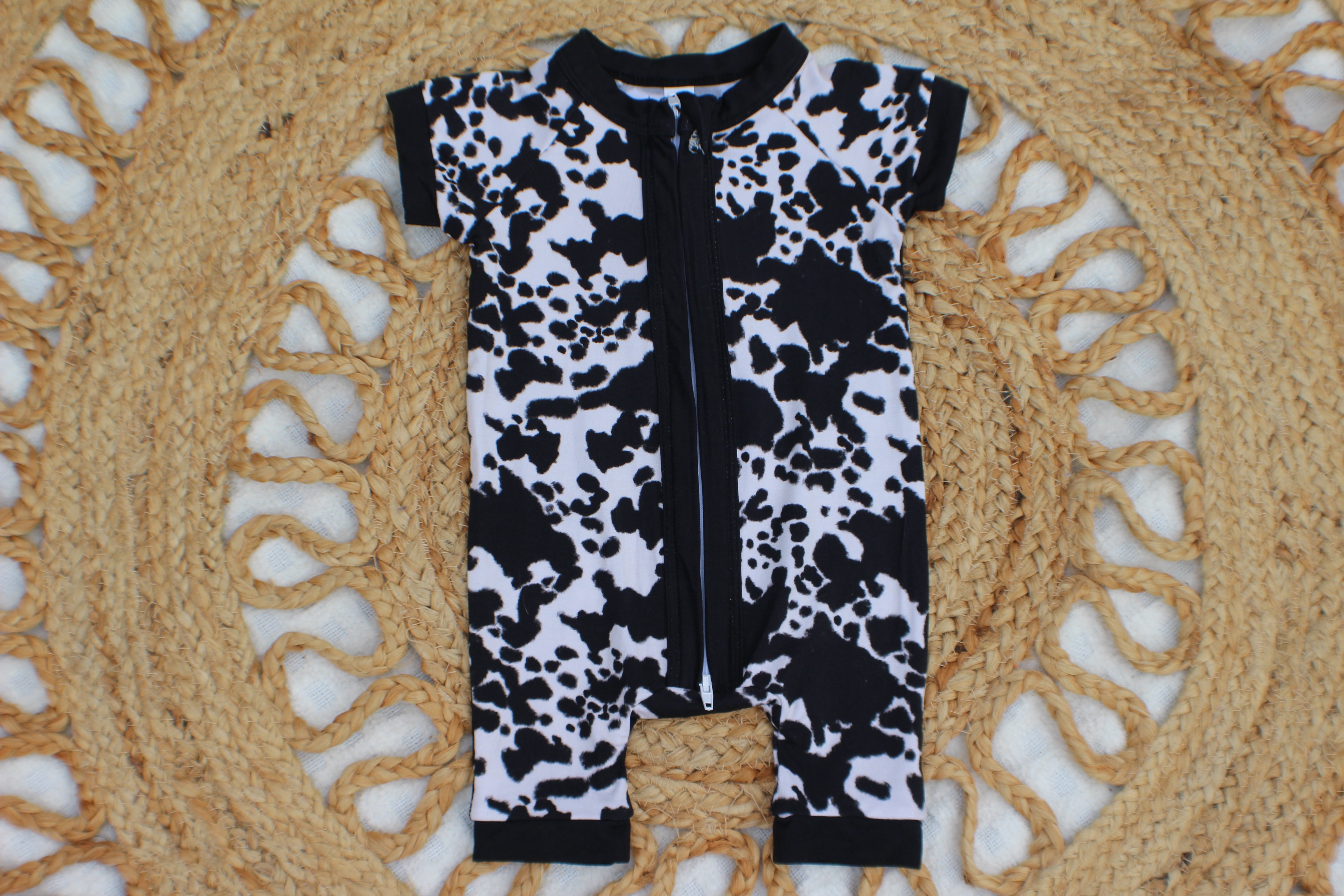 Black Cow Print Zippy