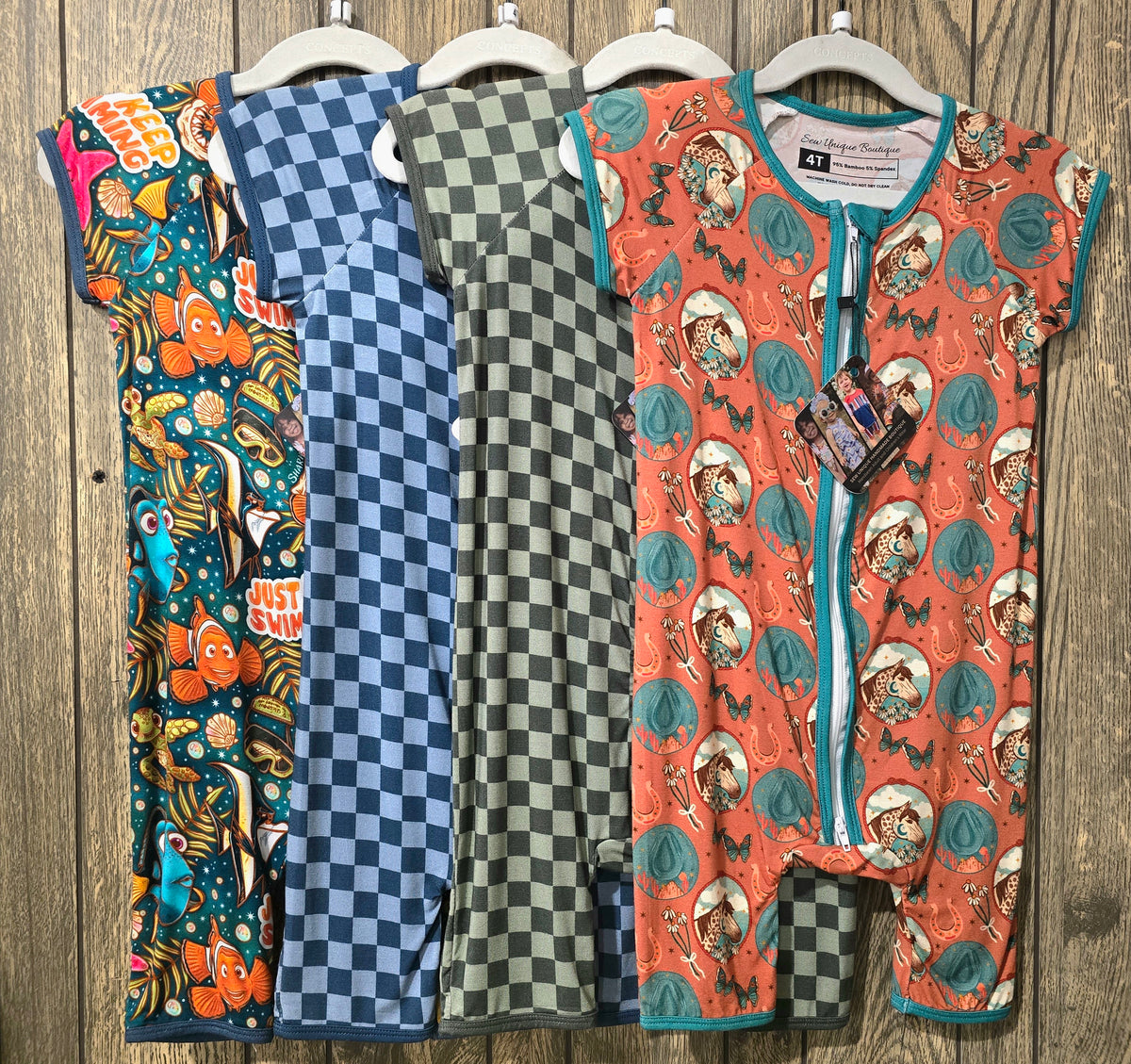 a group of clothes on swingers
