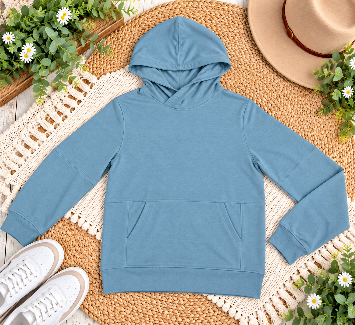 a blue hoodie on a rug